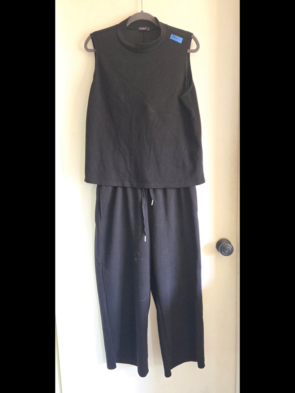 Sleeveless Black Wide-Leg Jumpsuit - Minimal Luxe